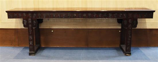 A large Chinese Hundred Shou rosewood (hongmu) altar table, early 20th century, length 258cm, depth 50cm, height 93.5cm, restorations